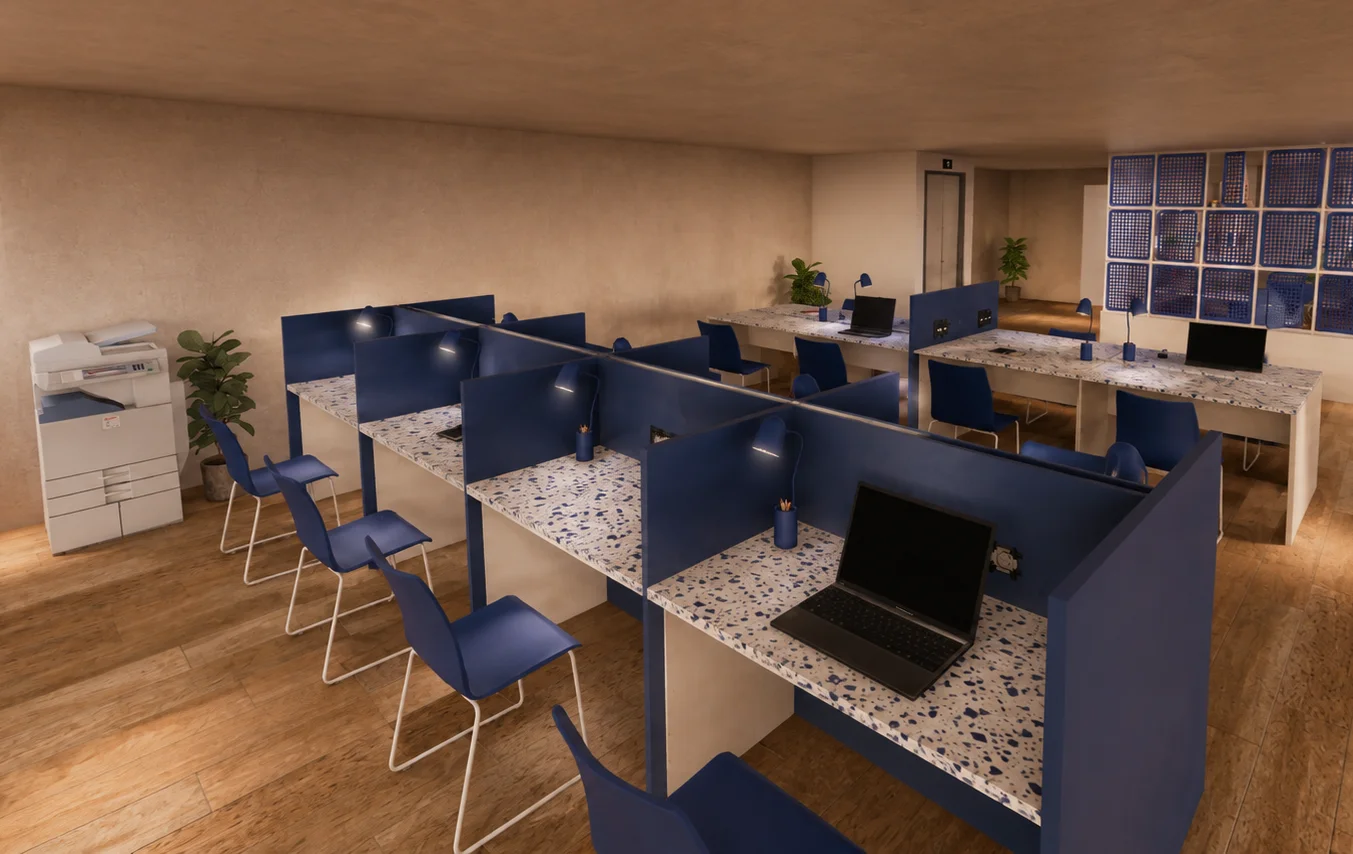 Coworking space with navy blue partitioned desks and terrazzo worktops